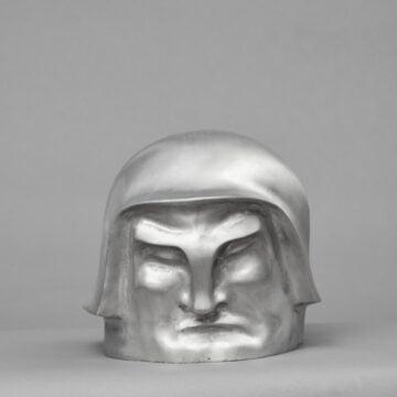 Giandante X , Testa d'uomo con elmetto, 1922 ca., bronzo, VAF 2287, Roverto, Mart